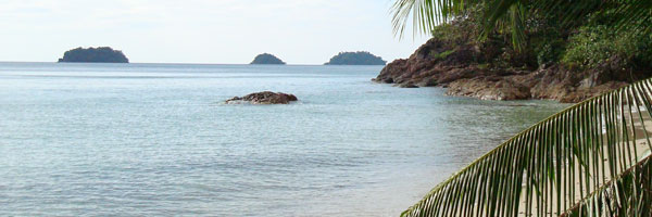 The beach is just one step away from the hillside bungalows